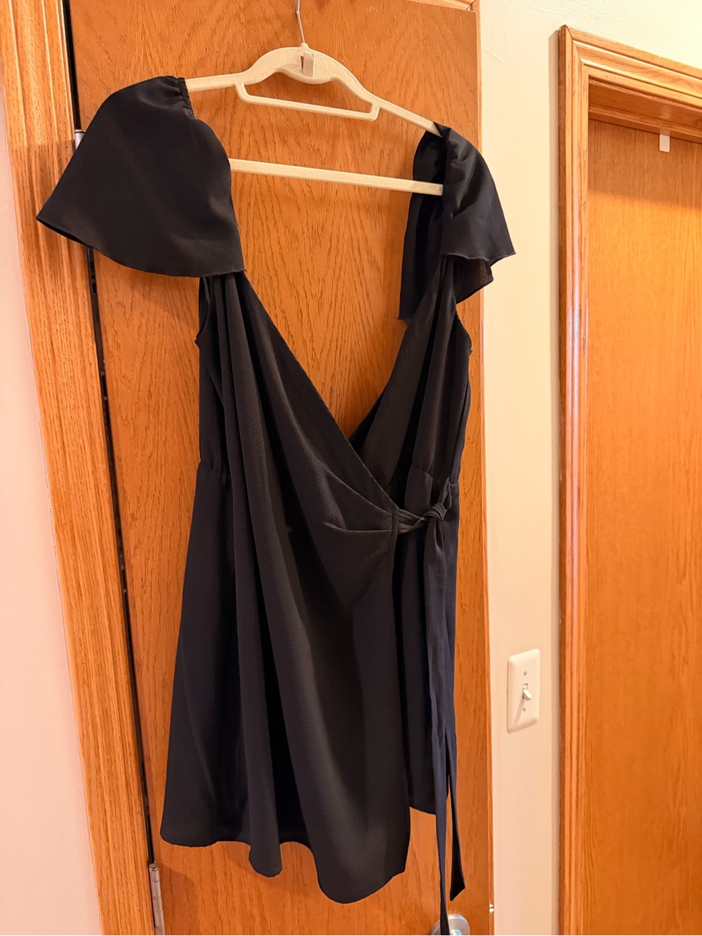 Show Me Your MuMu Black Backless Wrap Romper with Cap Sleeves
